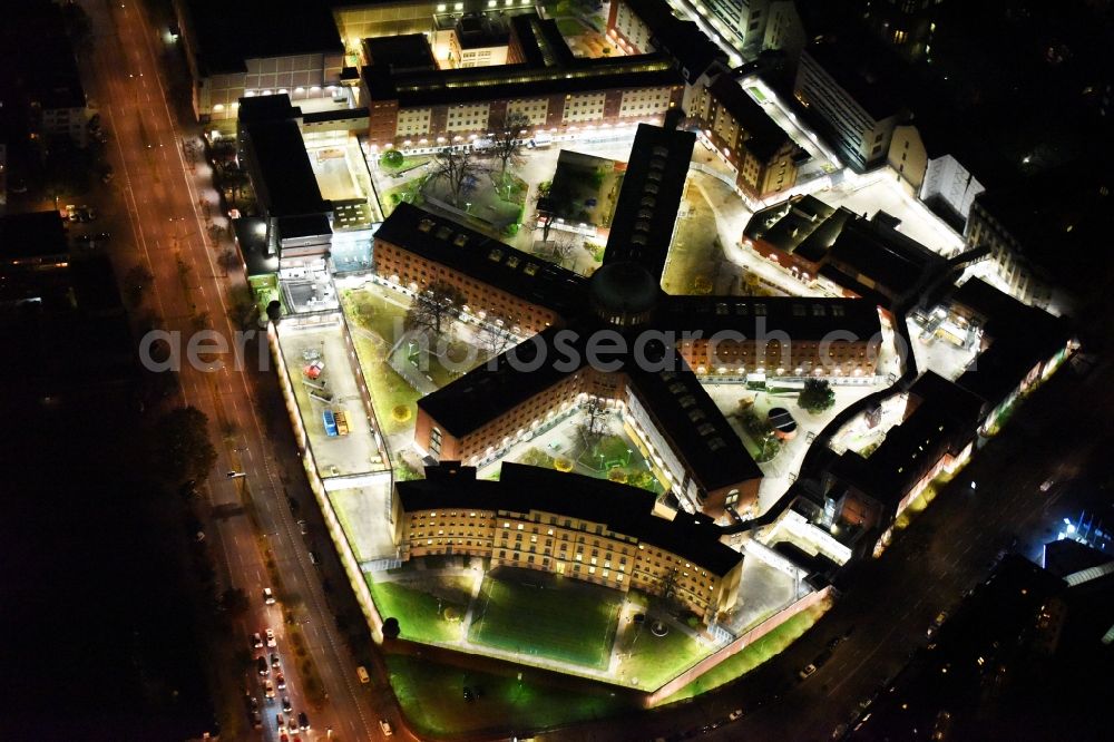 Aerial image at night Berlin - Night view of prison grounds and high security fence Prison Moabit in Alt-Moabit in Berlin