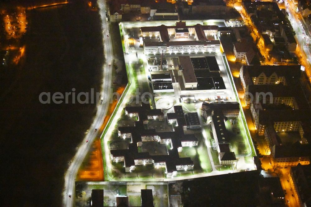 Aerial image at night Nürnberg - Night lighting Prison grounds and high security fence Prison Nuernberg - Jugendarrest on Mannertstrasse in Nuremberg in the state Bavaria, Germany