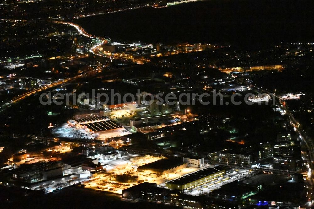 Aerial image at night Berlin - Night view site waste and recycling sorting BSR Recyclinghof Gradestrasse in the district Britz in Berlin