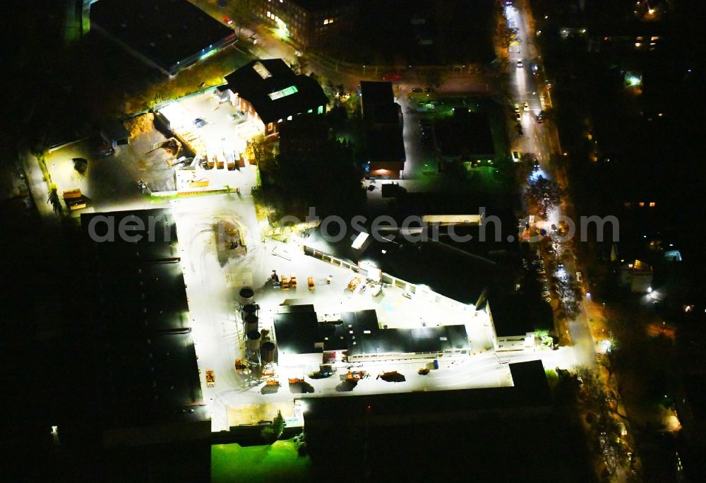 Berlin at night from above - Night lighting Site waste and recycling sorting BSR Recyclinghof Ostpreussendamm in Berlin, Germany