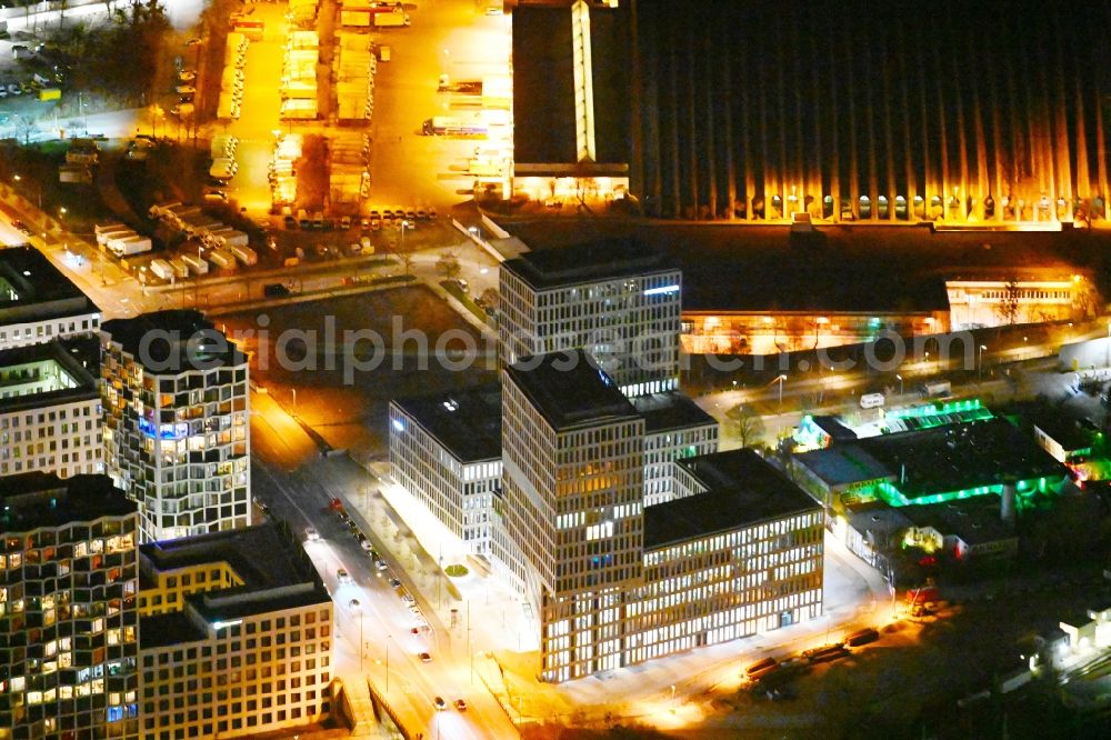 München at night from above - Night lighting building site office building Kap West on Friedenheimer Bruecke corner Birketweg in the district Hirschgarten in Munich in the state Bavaria, Germany