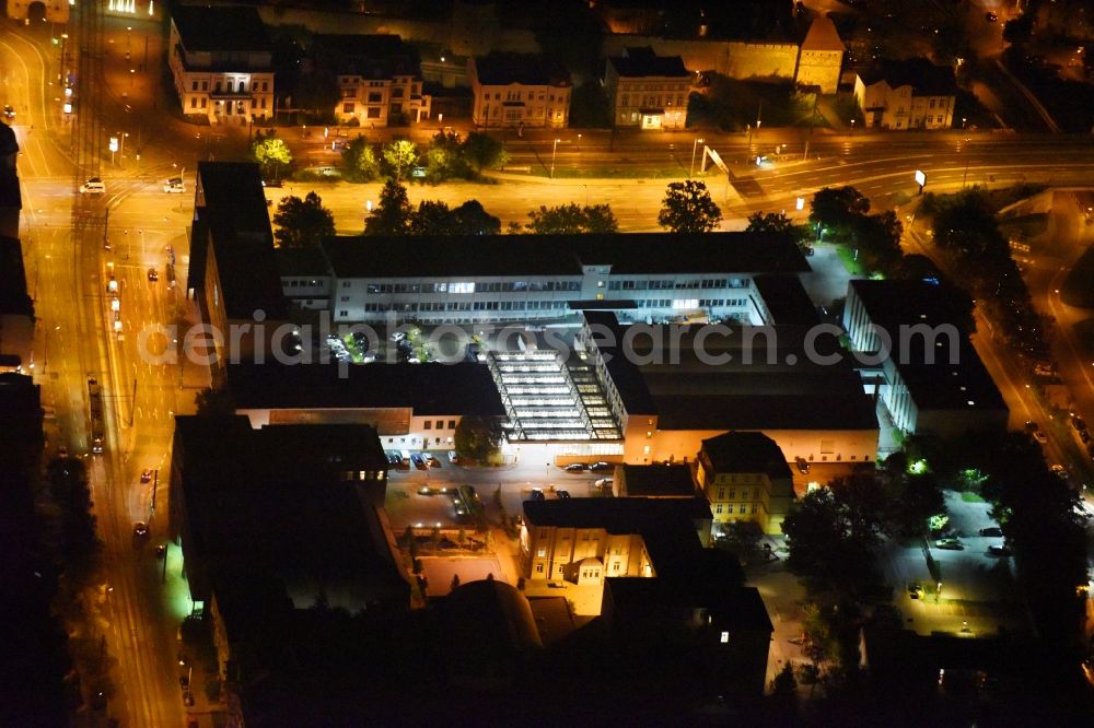 Aerial image at night Rostock - Night lighting Office building Lindenstrasse - Richard-Wagner-Strasse - Ernst-Barlach-Strasse in Rostock in the state Mecklenburg - Western Pomerania, Germany