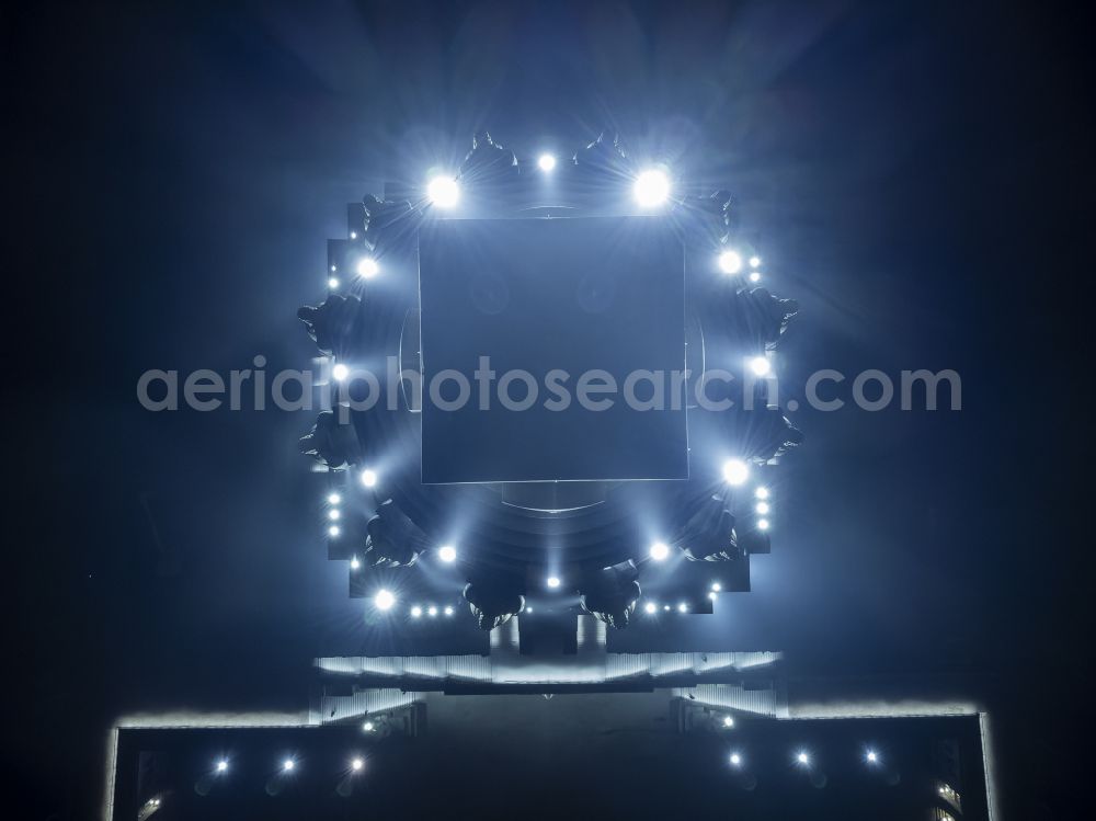 Aerial image at night Leipzig - Night lighting tourist attraction of the historic monument Voelkerschlachtdenkmal on Strasse of 18. Oktober in Leipzig in the state Saxony, Germany