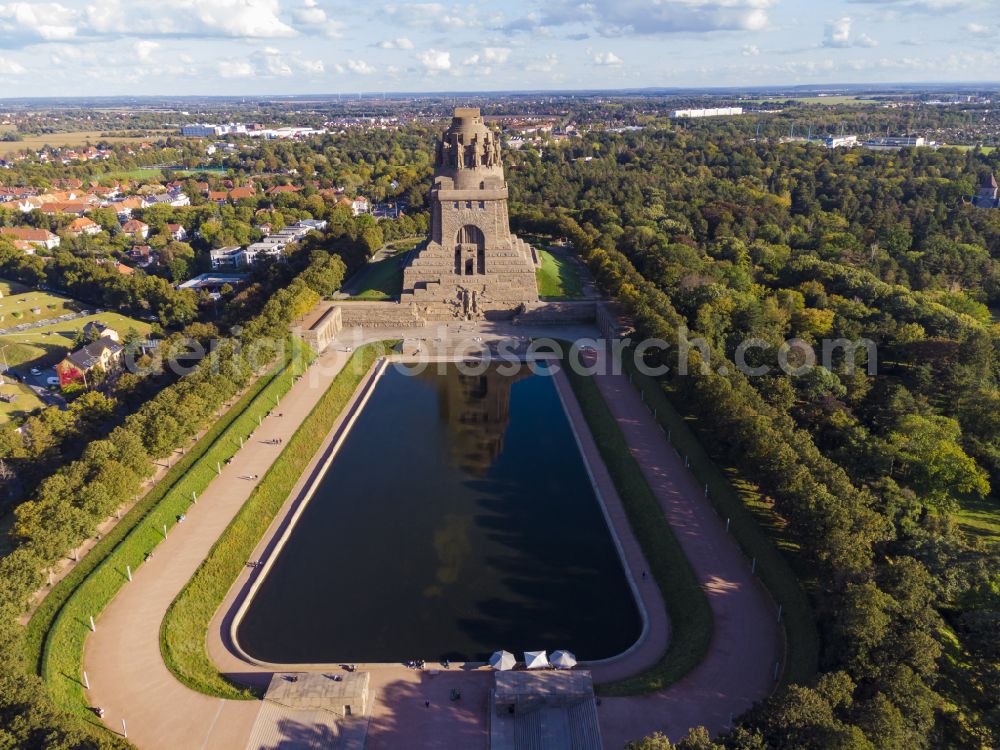 Aerial photograph at night Leipzig - Night lighting tourist attraction of the historic monument Voelkerschlachtdenkmal on Strasse of 18. Oktober in Leipzig in the state Saxony, Germany