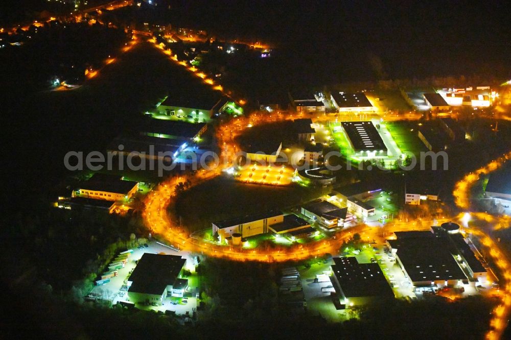 Ludwigsfelde at night from above - Night lighting Industrial estate and company settlement of Brandenburg Park Immobilien GmbH in Ludwigsfelde in the state Brandenburg, Germany