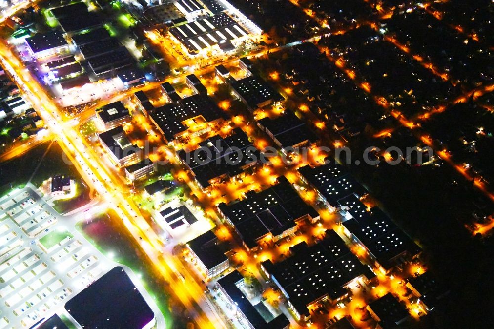 Aerial photograph at night Berlin - Night lighting Office and industrial estate Gip in Mahlsdorf