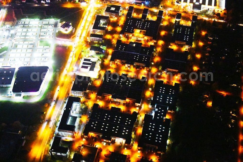 Aerial image at night Berlin - Night lighting Office and industrial estate Gip in Mahlsdorf