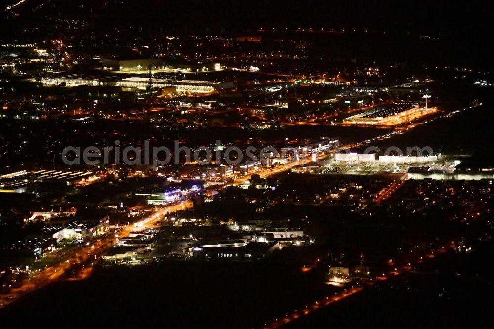 Aerial photograph at night Berlin - Night lighting industrial estate and company settlement along the federal street B1 in the district Mahlsdorf in Berlin, Germany