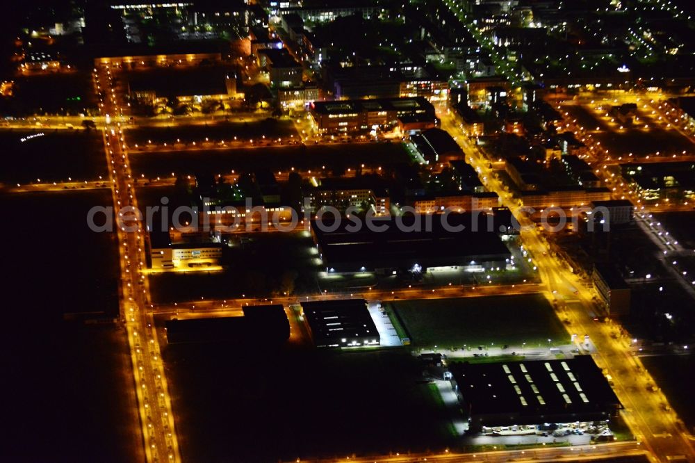 Berlin at night from above - Night aerial industrial area and development area at the Greater Berlin Dam on the grounds of the former airport Johannisthal in Berlin