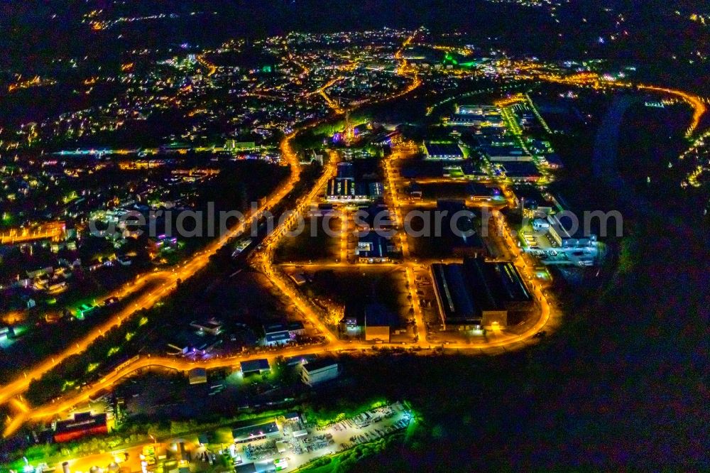 Hattingen at night from the bird perspective: Night lighting industrial estate and company settlement in the district Baak in Hattingen at Ruhrgebiet in the state North Rhine-Westphalia, Germany