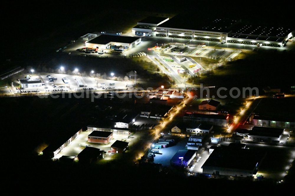 Aerial image at night Neudietendorf - Night lighting industrial estate and company settlement on Kornhochheimer Strasse in Neudietendorf in the state Thuringia, Germany