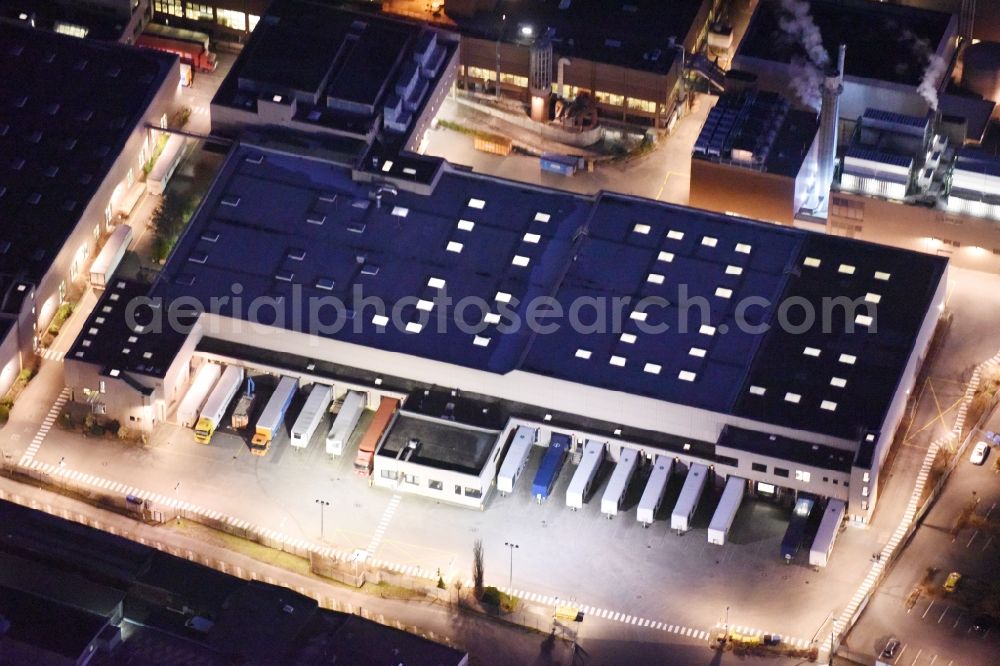 Aerial image at night Berlin - Night view industrial estate and company settlement at the Neukoellnische Allee in the district Neukoelln in Berlin