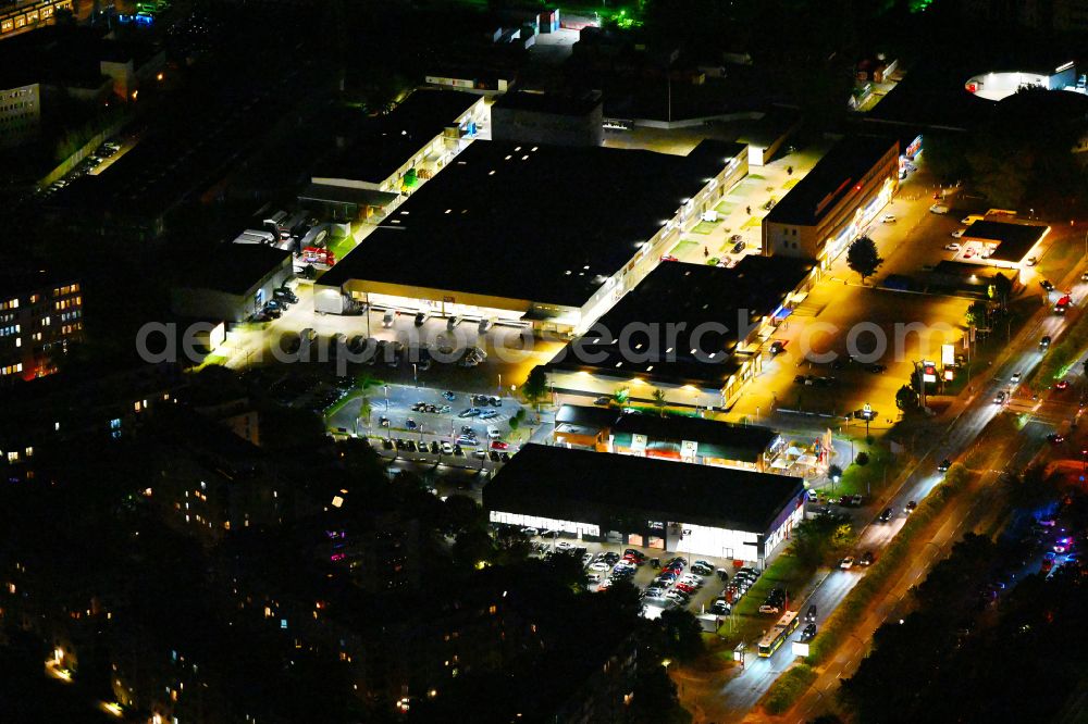 Berlin at night from above - Night lighting industrial estate and company settlement on Prenzlauer Promenade in the district Heinersdorf in Berlin, Germany