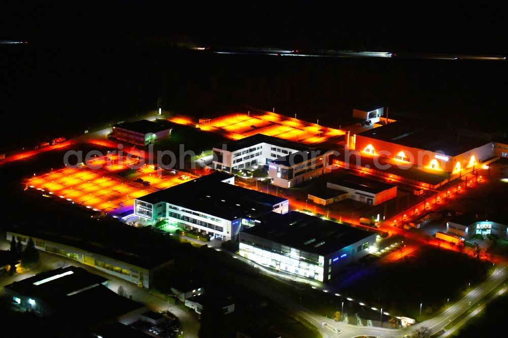 Aerial photograph at night Wimsheim - Night lighting industrial estate and company settlement around the Maybachstrasse in Wimsheim in the state Baden-Wurttemberg, Germany