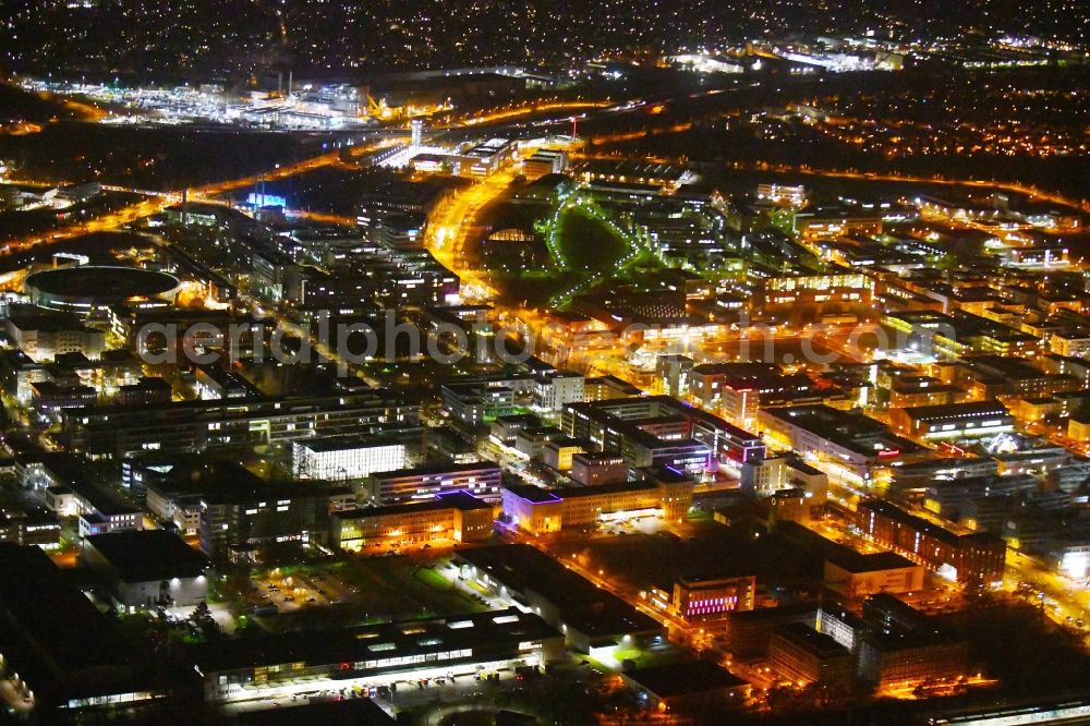 Berlin at night from the bird perspective: Night lighting industrial estate and company settlement Technologiepark Adlershof in the district Adlershof - Johannisthal in Berlin, Germany