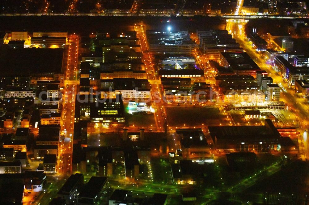 Berlin at night from the bird perspective: Night lighting industrial estate and company settlement Technologiepark Adlershof in the district Adlershof - Johannisthal in Berlin, Germany