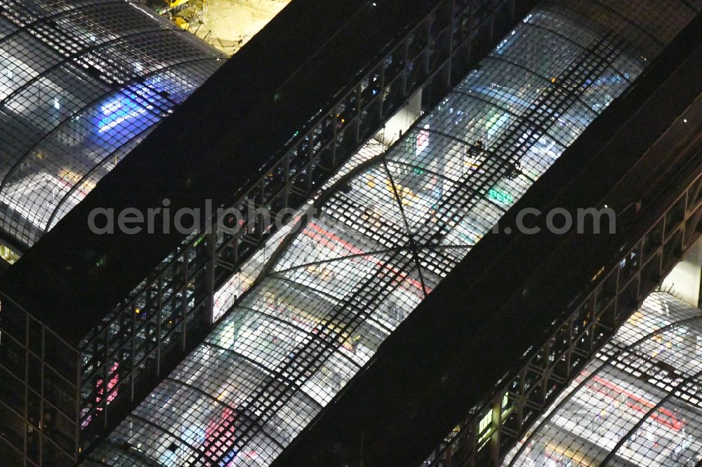 Aerial photograph at night Berlin - Night lighting Track progress and building of the main station of the railway in Berlin, Germany