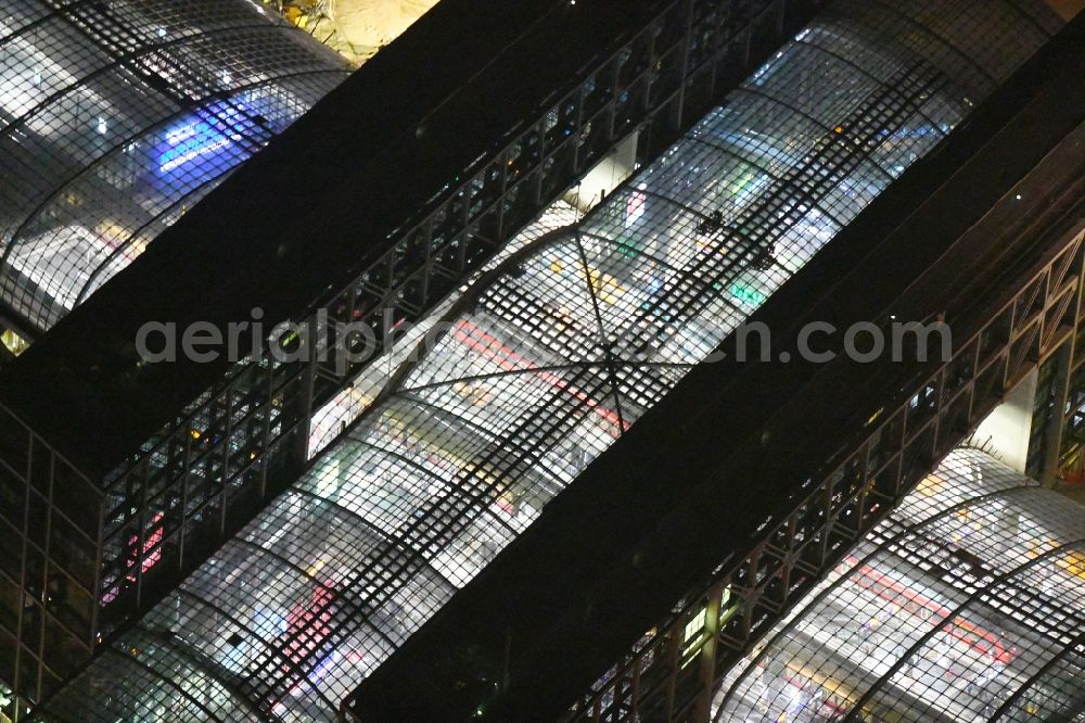 Aerial image at night Berlin - Night lighting Track progress and building of the main station of the railway in Berlin, Germany