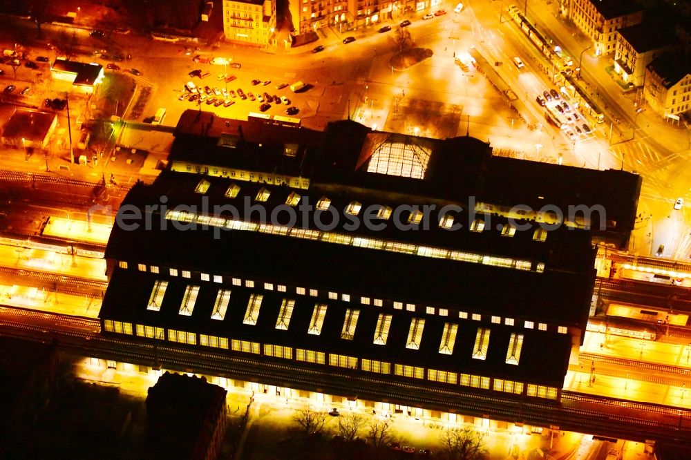 Dresden at night from the bird perspective: Night lighting station railway building of the Deutsche Bahn in Dresden in the state Saxony, Germany