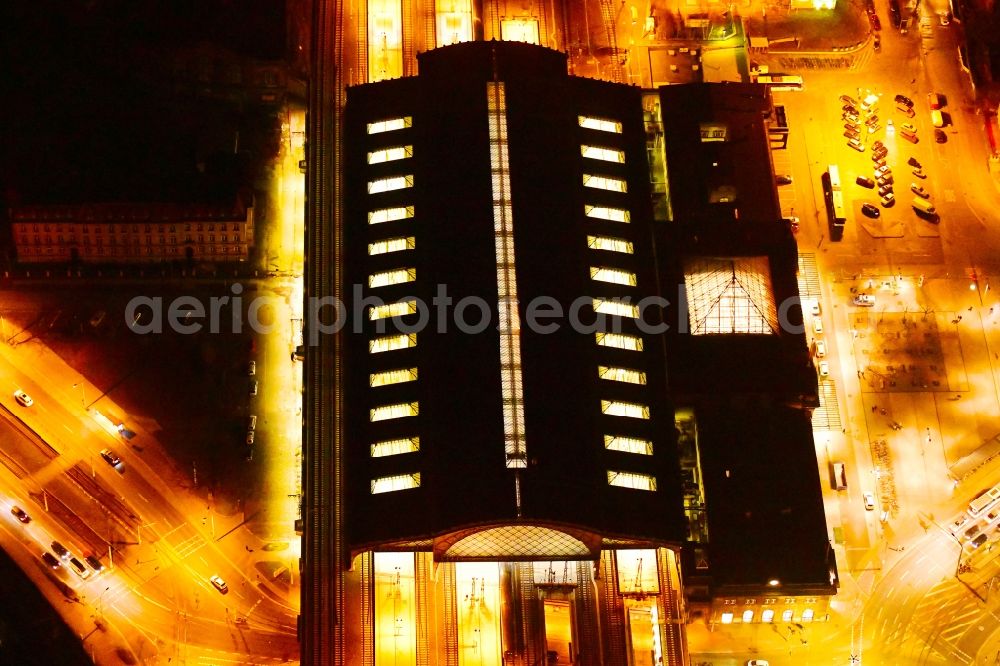 Dresden at night from the bird perspective: Night lighting station railway building of the Deutsche Bahn in Dresden in the state Saxony, Germany