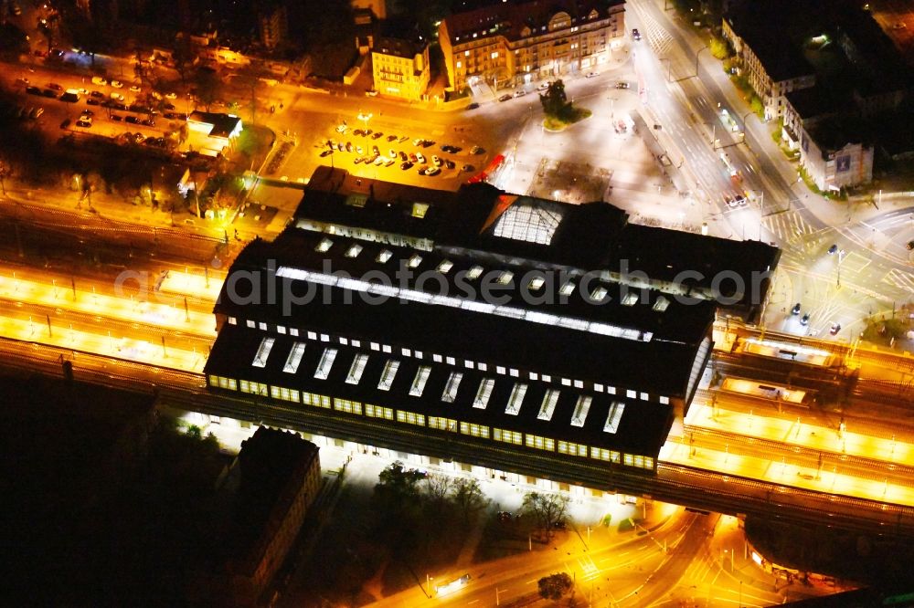 Aerial photograph at night Dresden - Night lighting station railway building of the Deutsche Bahn in Dresden in the state Saxony, Germany