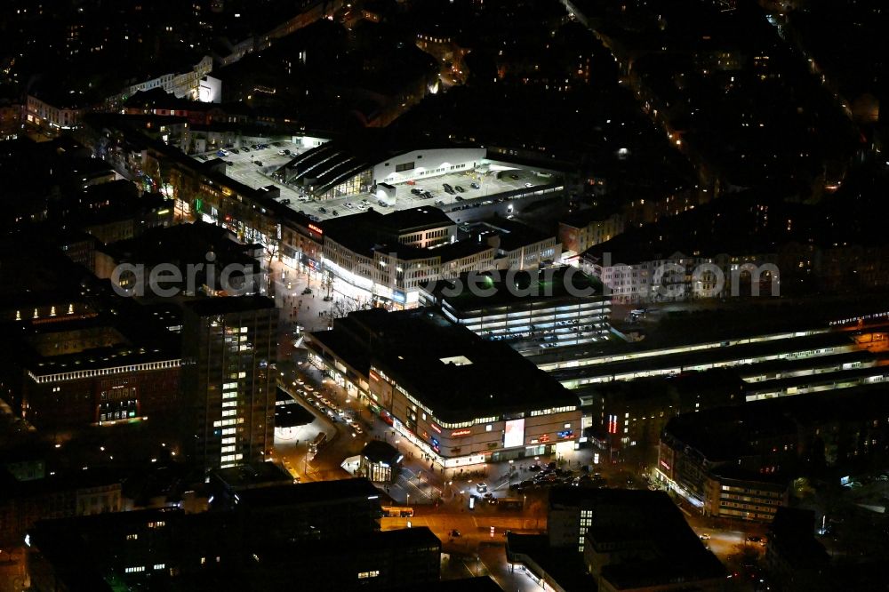 Hamburg at night from above - Night lights and lighting track layout and station building of the Deutsche Bahn at the station Hamburg-Altona at the EKZ shopping center Mercado in the district Altona in Hamburg, Germany