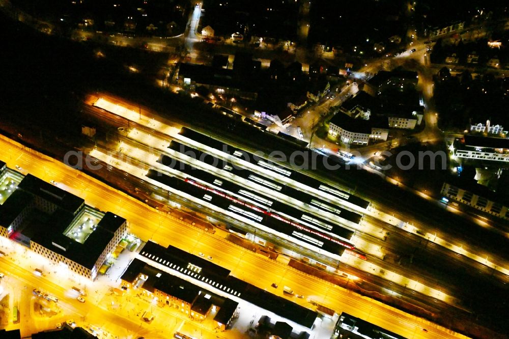 München at night from the bird perspective: Night lighting station railway building of the Deutsche Bahn on Bahnhof Muenchen-Pasing in Munich in the state Bavaria, Germany