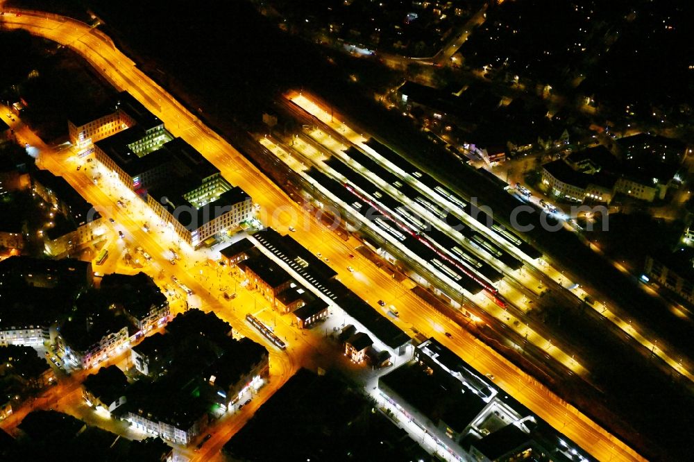 Aerial image at night München - Night lighting station railway building of the Deutsche Bahn on Bahnhof Muenchen-Pasing in Munich in the state Bavaria, Germany