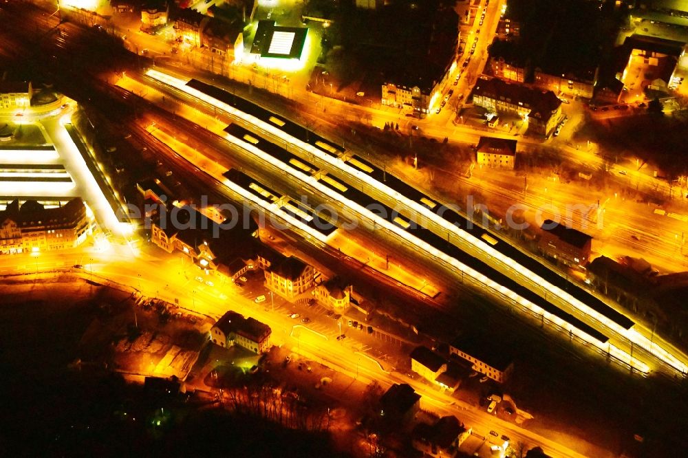 Aerial photograph at night Eisenach - Night lighting station railway building of the Deutsche Bahn in Eisenach in the state Thuringia, Germany