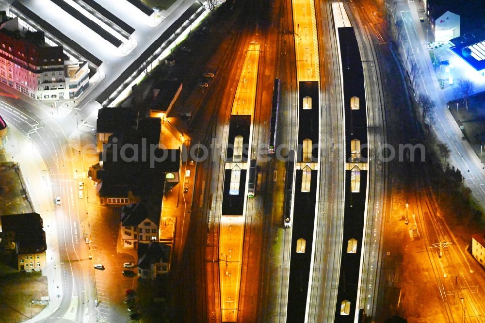 Aerial photograph at night Eisenach - Night lighting station railway building of the Deutsche Bahn in Eisenach in the Thuringian Forest in the state Thuringia, Germany