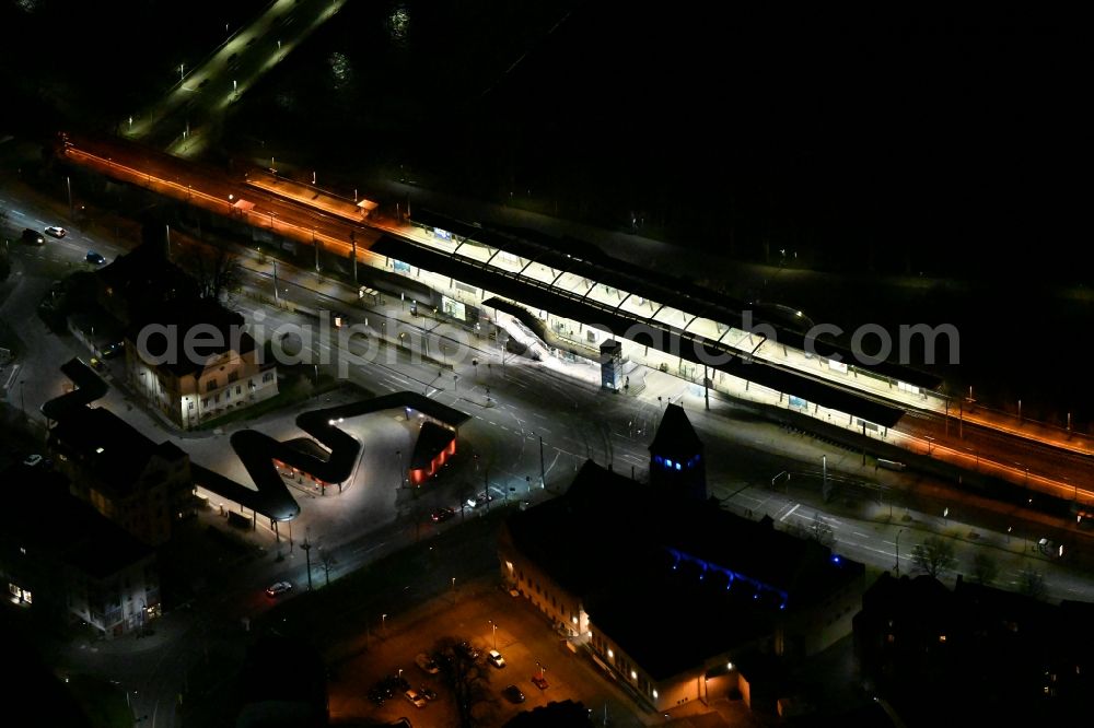 Aerial image at night Jena - Night lighting station railway building of the Deutsche Bahn Paradiesbahnhof in Jena in the state Thuringia, Germany