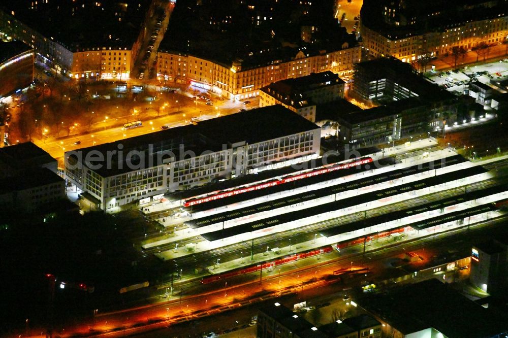 Aerial image at night München - Night lighting station railway building of the Deutsche Bahn in the district Au-Haidhausen in Munich in the state Bavaria, Germany