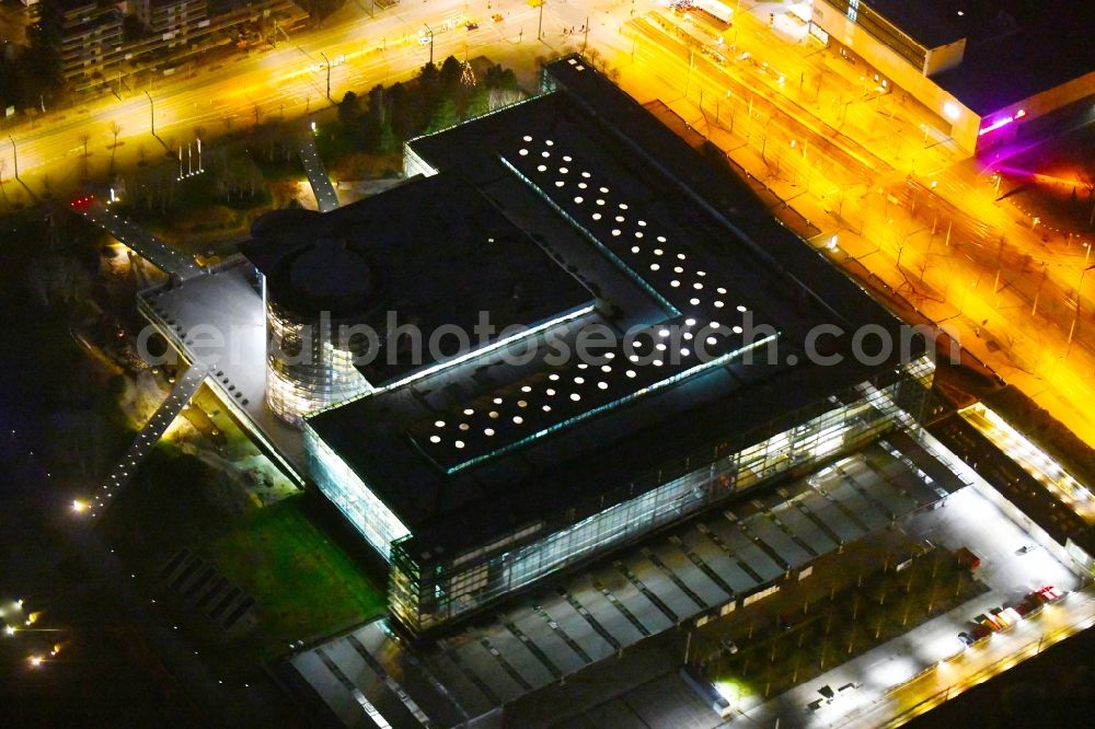 Dresden at night from the bird perspective: Night lighting VW transparent factory in Dresden in Saxony. The transparent factory is a Dresden automobile factory of Volkswagen AG, which is operated by the Volkswagen Sachsen GmbH