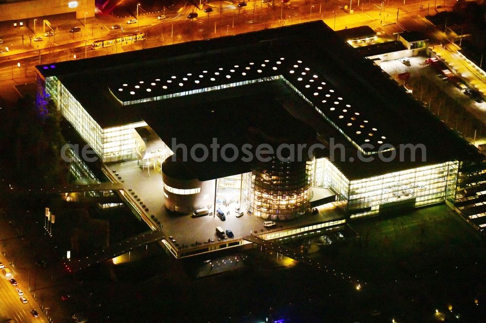 Dresden at night from the bird perspective: Night lighting vW transparent factory in Dresden in Saxony. The transparent factory is a Dresden automobile factory of Volkswagen AG, which is operated by the Volkswagen Sachsen GmbH