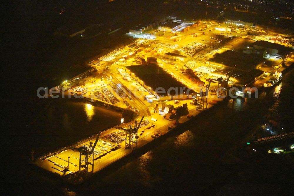 Aerial photograph at night Hamburg - Night lighting Port facilities on the shores of the harbor of Kleiner Grasbrook in Hamburg, Germany