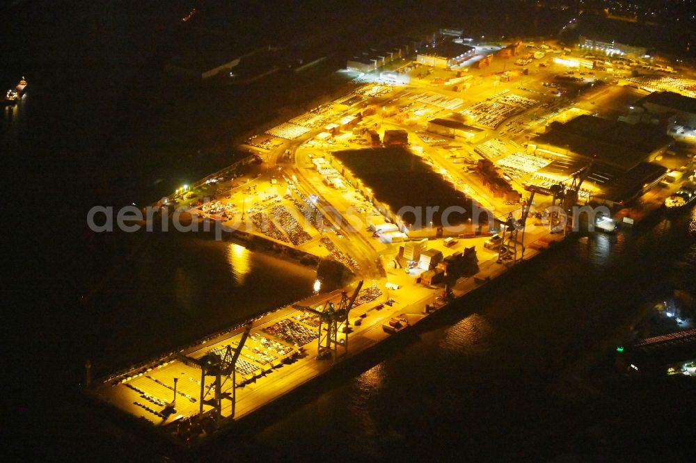 Aerial image at night Hamburg - Night lighting Port facilities on the shores of the harbor of Kleiner Grasbrook in Hamburg, Germany