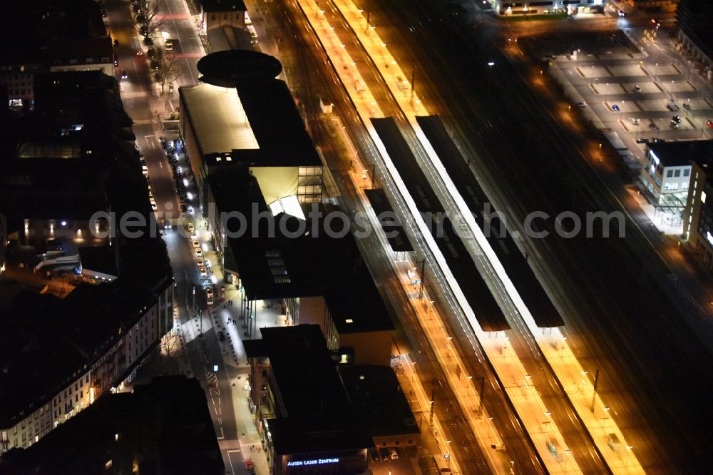 Aschaffenburg at night from above - Night view Track progress and building of the main station of the railway in Aschaffenburg in the state Bavaria