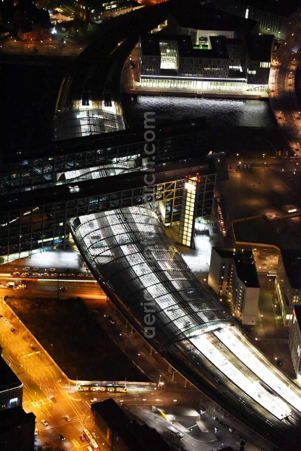 Aerial image at night Berlin - Night view of track progress and building of the main station of the railway in Berlin in Germany