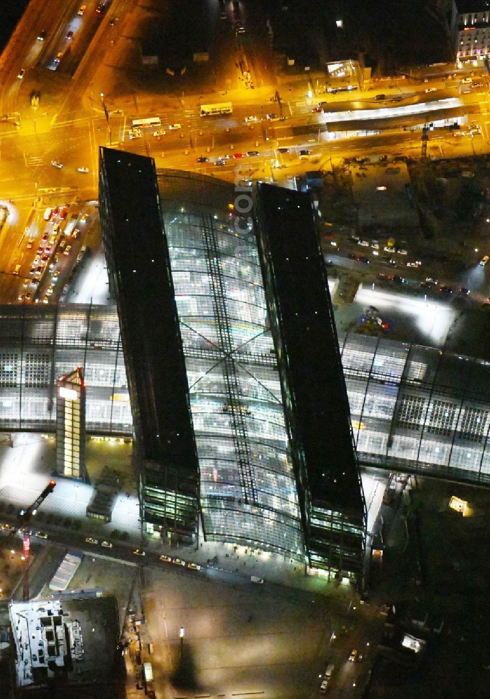 Aerial image at night Berlin - Night lighting Track progress and building of the main station of the railway in Berlin, Germany