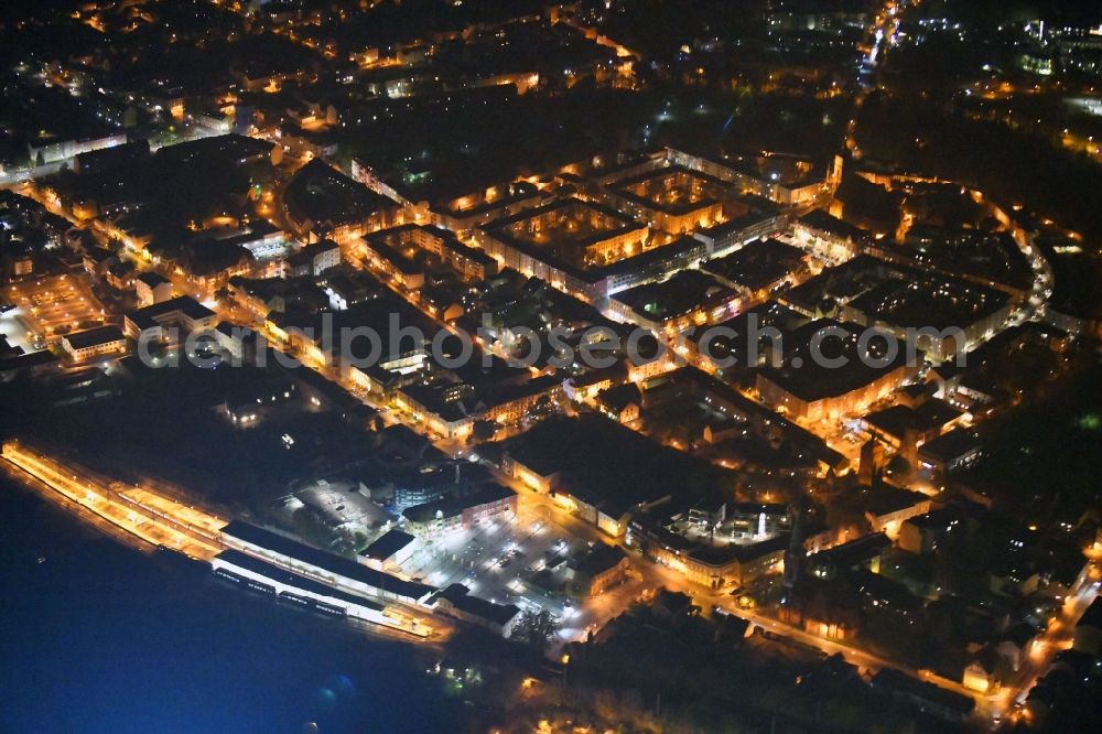 Bernau at night from above - Night lighting Track progress and building of the main station of the railway in Bernau in the state Brandenburg, Germany