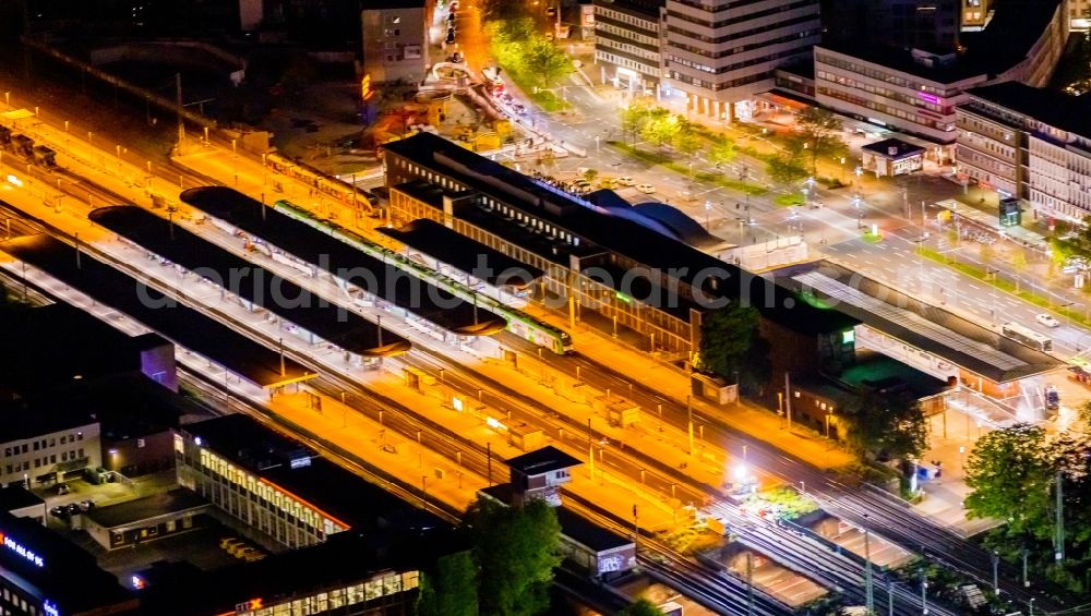 Bochum at night from above - Night lighting track progress and building of the main station of the railway in the district Bochum Mitte in Bochum in the state North Rhine-Westphalia