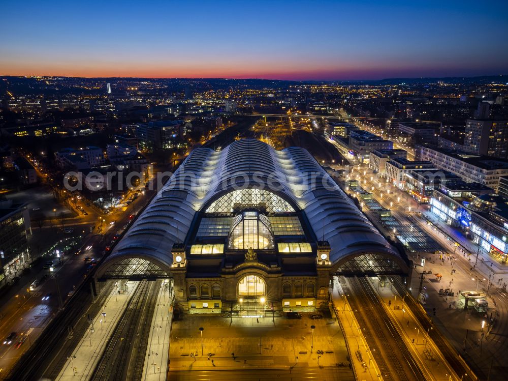 Aerial image at night Dresden - Night lighting track progress and building of the main station of the railway in Dresden in the state Saxony, Germany