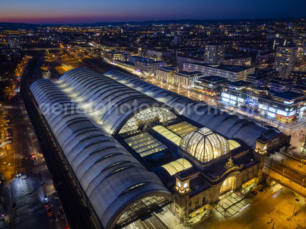 Dresden at night from above - Night lighting track progress and building of the main station of the railway in Dresden in the state Saxony, Germany