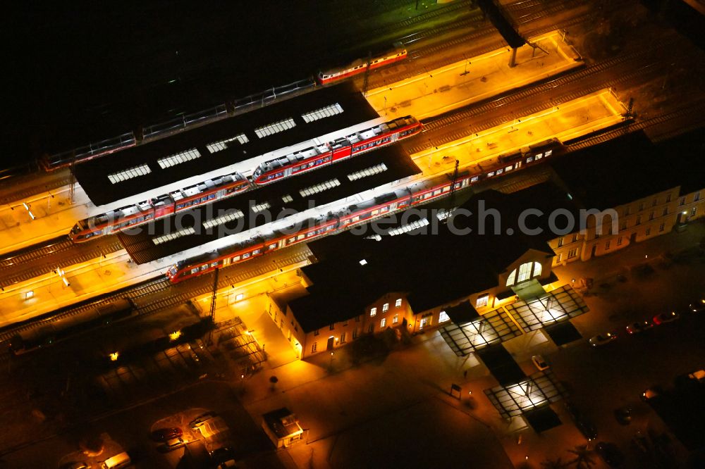 Eberswalde at night from above - Night lighting Track progress and building of the main station of the railway on street Bahnhofsring in Eberswalde in the state Brandenburg, Germany