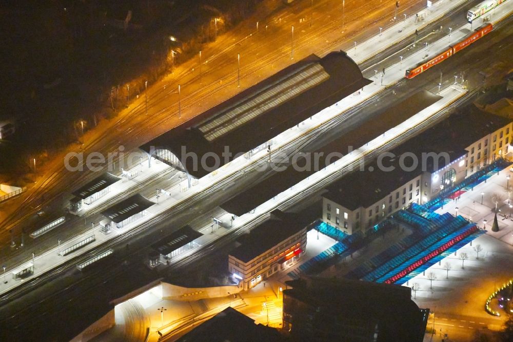 Gera at night from above - Night lighting Track progress and building of the main station of the railway in Gera in the state Thuringia, Germany