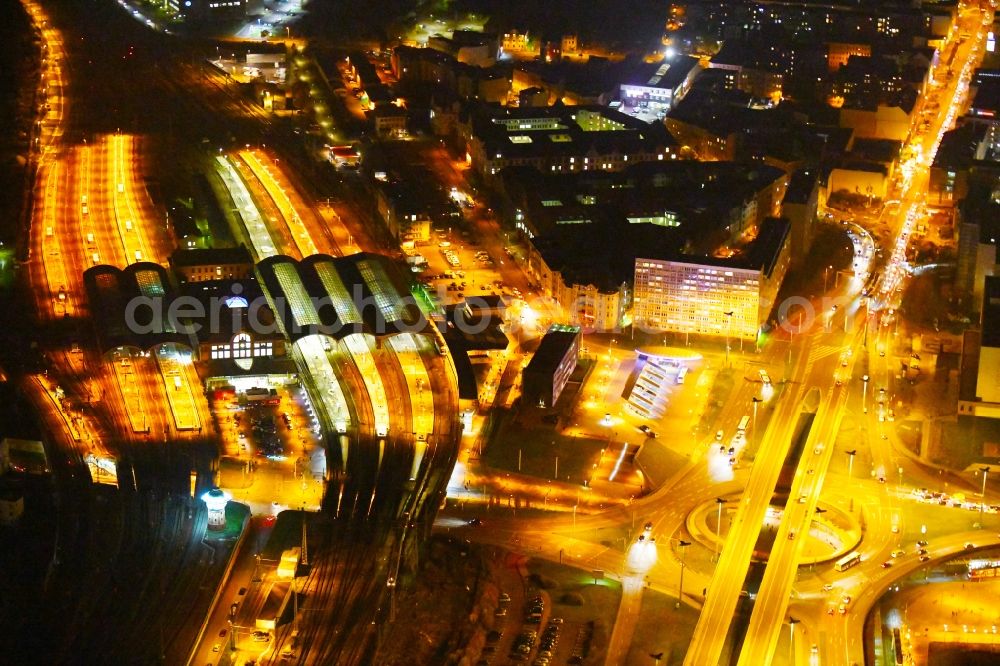 Halle (Saale) at night from above - Night lighting Track progress and building of the main station of the railway in Halle (Saale) in the state Saxony-Anhalt, Germany