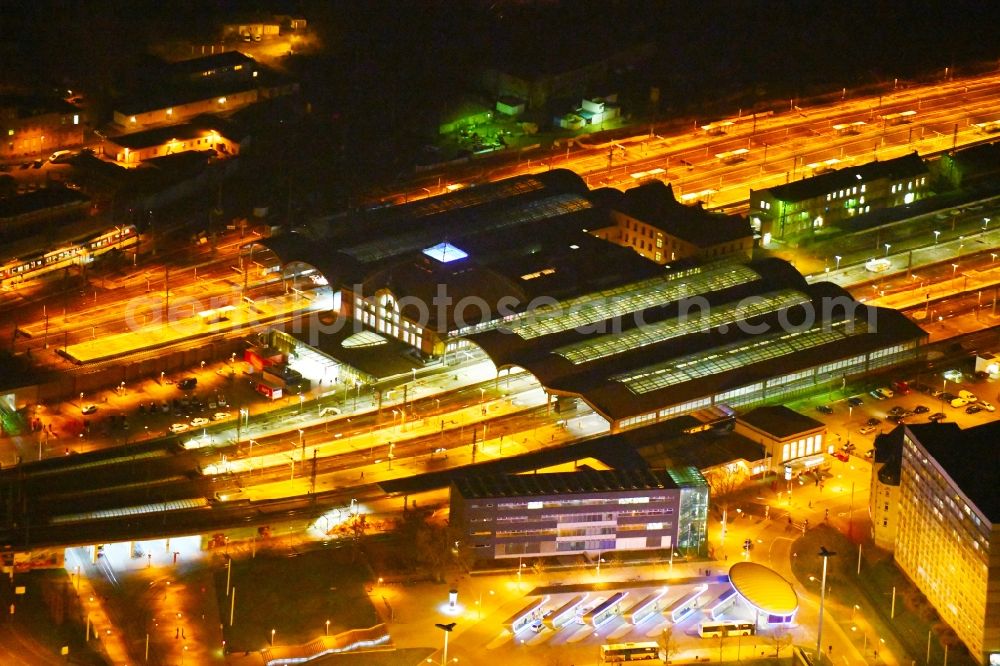 Halle (Saale) at night from above - Night lighting Track progress and building of the main station of the railway in Halle (Saale) in the state Saxony-Anhalt, Germany