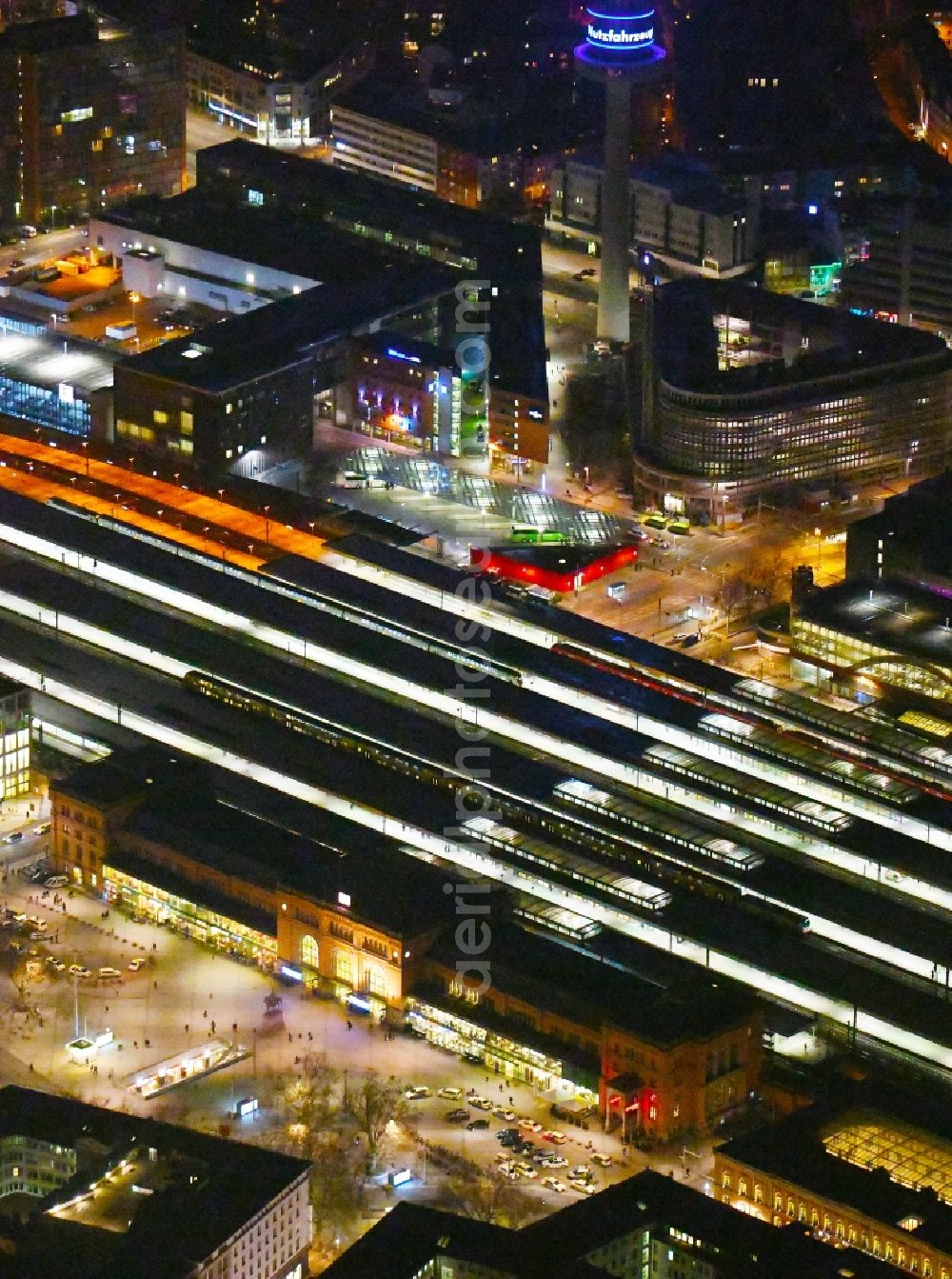 Aerial image at night Hannover - Night lighting Track progress and building of the main station of the railway in Hannover in the state Lower Saxony, Germany