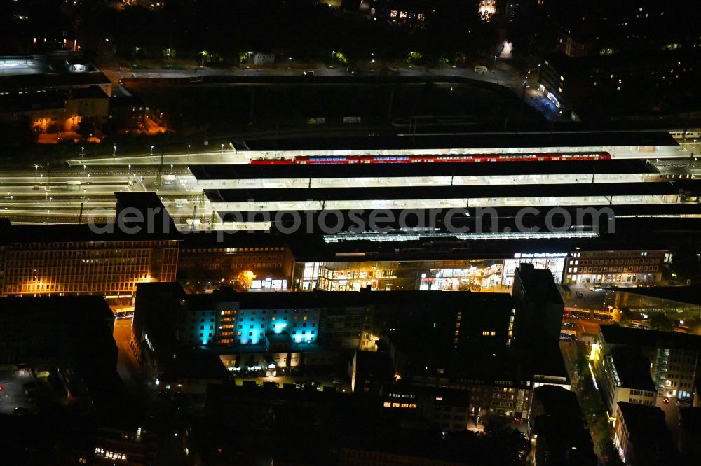 Münster at night from above - Night lighting Track progress and building of the main station of the railway in Muenster in the state North Rhine-Westphalia, Germany