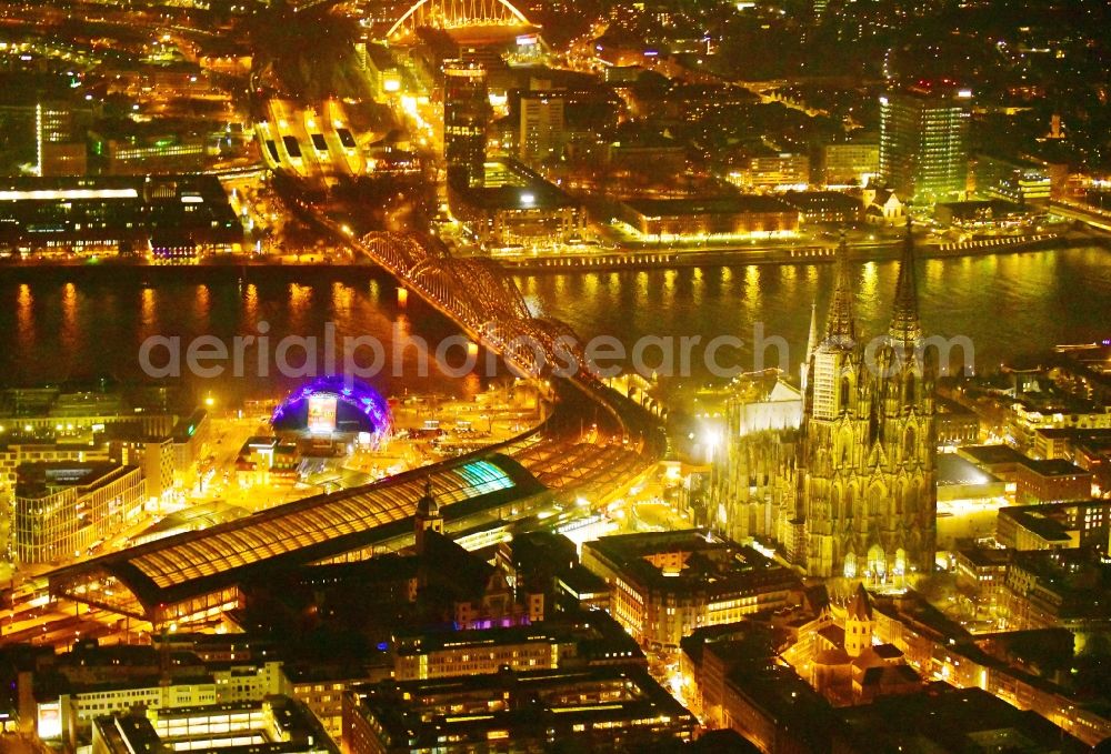 Köln at night from above - Night lighting track progress and building of the main station of the railway in the district Innenstadt in Cologne in the state North Rhine-Westphalia, Germany